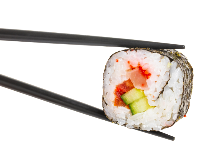 Close-up of a sushi roll being held with chopsticks, featuring sushi rice, seaweed, and various fillings including cucumber and seafood.